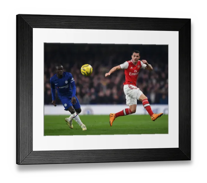 Framed Print : Xhaka vs. Kante: Intense Battle in Chelsea vs. Arsenal Premier League Clash (2019-20) Framed Print : Xhaka vs. Kante: Intense Battle in Chelsea vs. Arsenal Premier League Clash (2019-20)