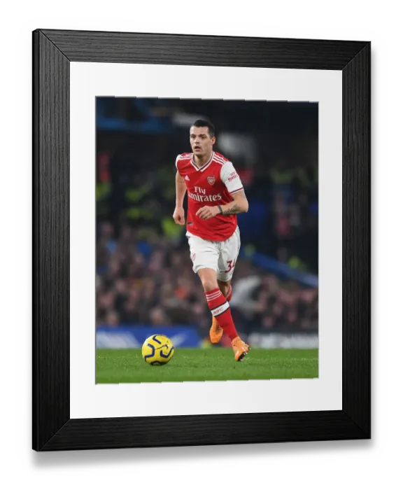 Framed Print : Granit Xhaka in Action: Arsenal vs. Chelsea, Premier League 2019-20 Framed Print : Granit Xhaka in Action: Arsenal vs. Chelsea, Premier League 2019-20