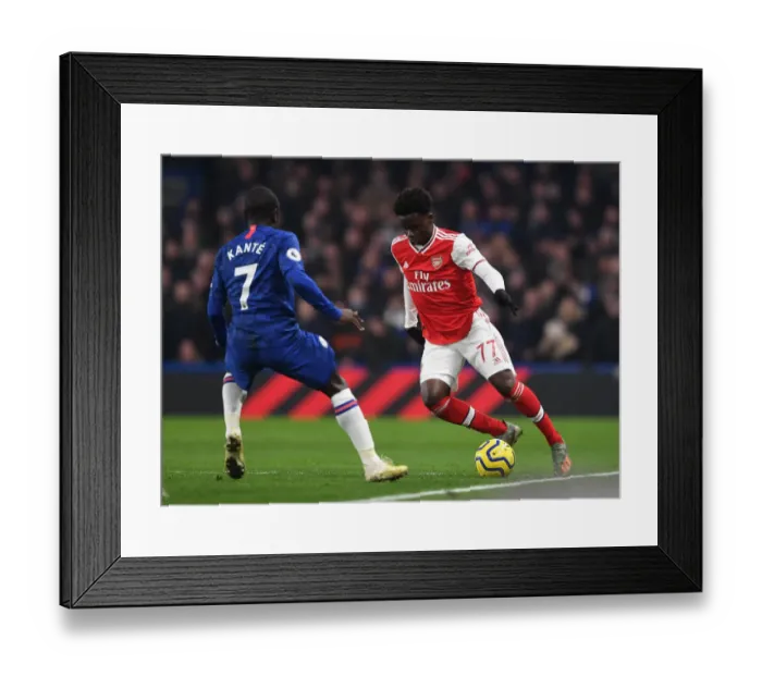 Framed Print : Clash of Stars: Saka vs. Azpilicueta - A Premier League Showdown at Stamford Bridge Framed Print : Clash of Stars: Saka vs. Azpilicueta - A Premier League Showdown at Stamford Bridge