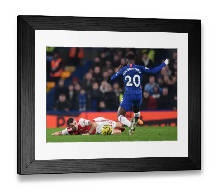 Framed Print : Clash at Stamford Bridge: Xhaka vs Hudson-Odoi in Premier League Showdown