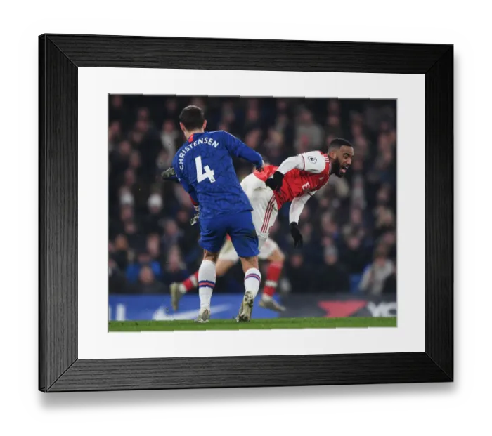 Framed Print : Clash at Stamford Bridge: Lacazette Fouls by Christensen in Premier League Showdown (Chelsea v Arsenal 2019-20) Framed Print : Clash at Stamford Bridge: Lacazette Fouls by Christensen in Premier League Showdown (Chelsea v Arsenal 2019-20)