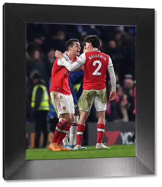 Celebrating Victory: Xhaka and Bellerin Rejoice After Arsenal's Win Against Chelsea