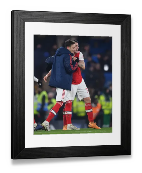 Framed Print : Xhaka and Ozil: Post-Match Moment at Stamford Bridge - Chelsea vs Arsenal, Premier League 2019-2020