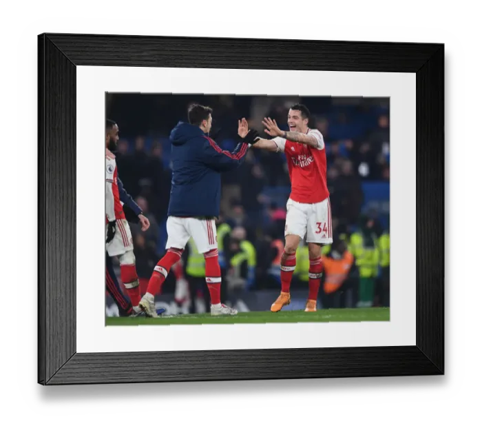 Framed Print : Celebrating Victory: Xhaka and Ozil Reunite in Arsenal's Chelsea Win (2019-20) Framed Print : Celebrating Victory: Xhaka and Ozil Reunite in Arsenal's Chelsea Win (2019-20)