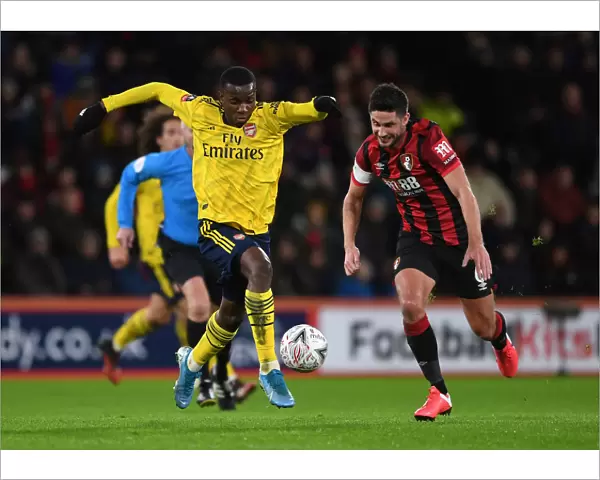 Arsenal's Nketiah Clashes with Surman in FA Cup Battle