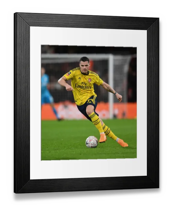 Framed Print : Granit Xhaka's Midfield Masterclass: Arsenal's Victory over AFC Bournemouth in the FA Cup