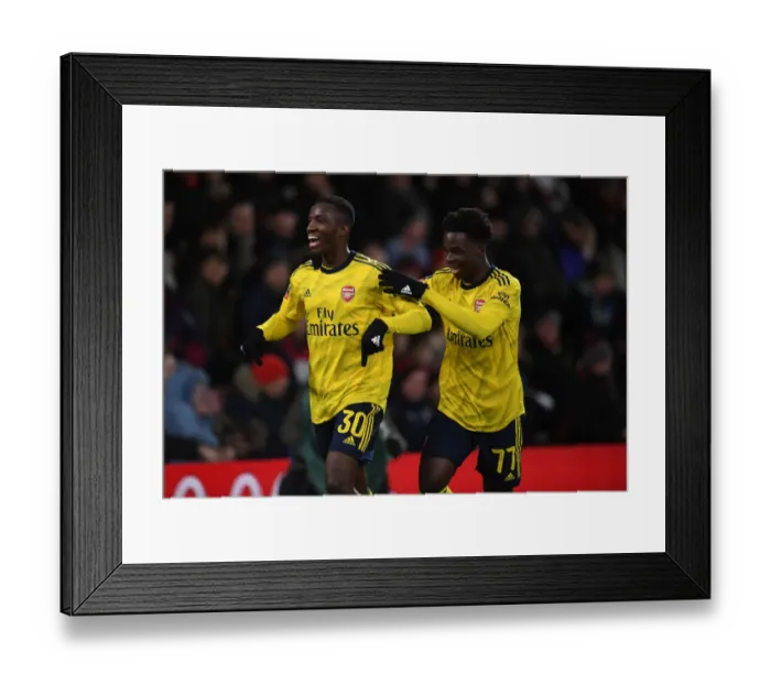 Framed Print : Arsenal's Nketiah and Saka Celebrate FA Cup Goals Against AFC Bournemouth