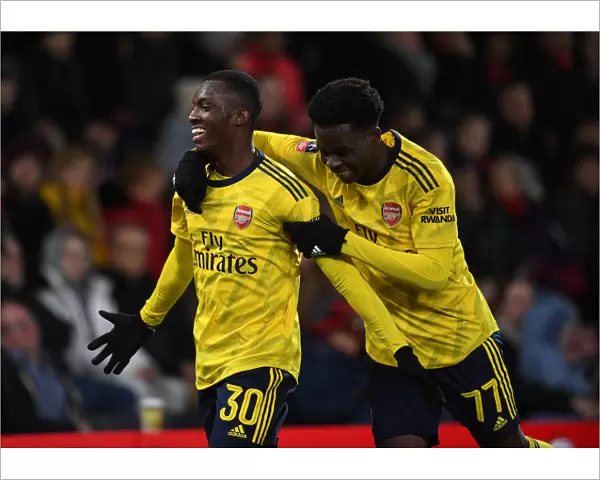 Arsenal's Nketiah and Saka Celebrate Goals in FA Cup Fourth Round Win over Bournemouth