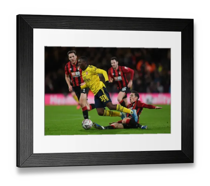 Framed Print : Arsenal's Eddie Nketiah Faces Off Against Bournemouth's Harry Wilson in FA Cup Clash Framed Print : Arsenal's Eddie Nketiah Faces Off Against Bournemouth's Harry Wilson in FA Cup Clash