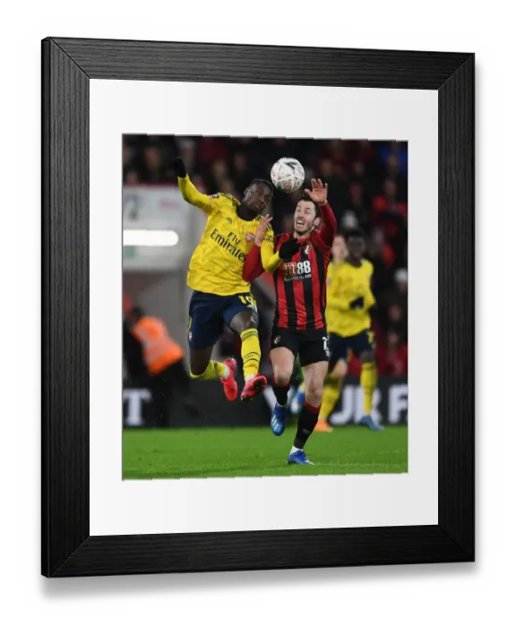 Framed Print : Pepe vs Smith: Intense Clash in FA Cup Fourth Round between AFC Bournemouth and Arsenal Framed Print : Pepe vs Smith: Intense Clash in FA Cup Fourth Round between AFC Bournemouth and Arsenal