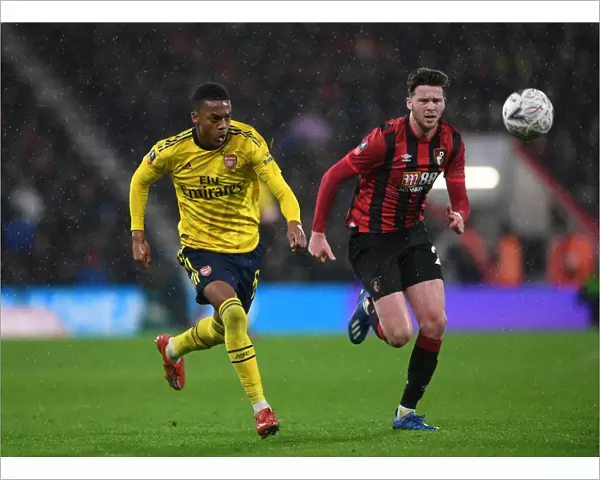 Arsenal's Joe Willock Clashes with Bournemouth's Jack Simpson in FA Cup Fourth Round