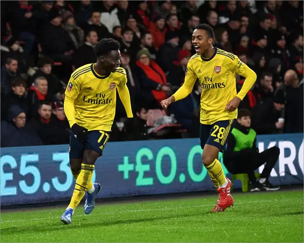 Arsenal's Bukayo Saka and Joe Willock Celebrate Goal in FA Cup Fourth Round Against AFC Bournemouth