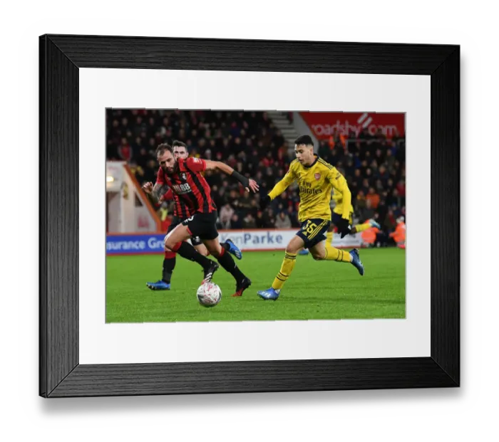 Framed Print : Gabriel Martinelli vs Steve Cook: AFC Bournemouth vs Arsenal FC - FA Cup Fourth Round Clash
