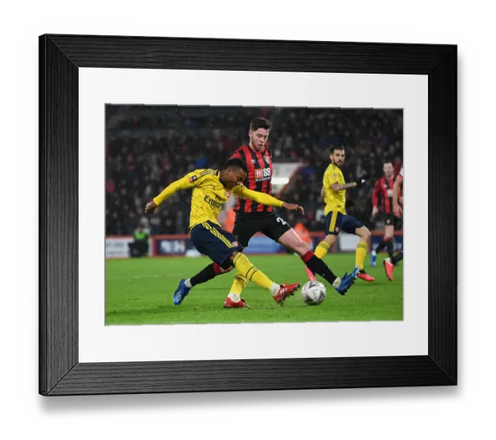 Framed Print : Arsenal's Joe Willock Faces Pressure from Bournemouth's Jack Simpson in FA Cup Clash Framed Print : Arsenal's Joe Willock Faces Pressure from Bournemouth's Jack Simpson in FA Cup Clash