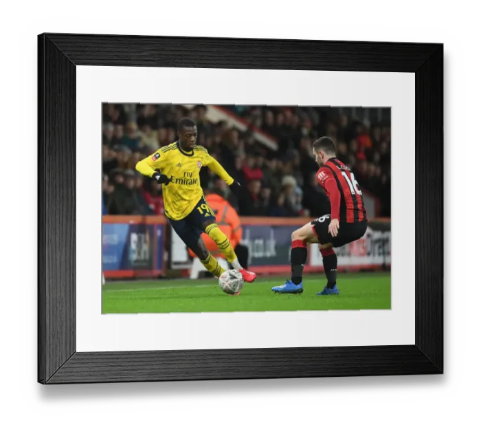 Framed Print : Pepe vs Cook: AFC Bournemouth vs Arsenal FC - FA Cup Fourth Round Clash Framed Print : Pepe vs Cook: AFC Bournemouth vs Arsenal FC - FA Cup Fourth Round Clash