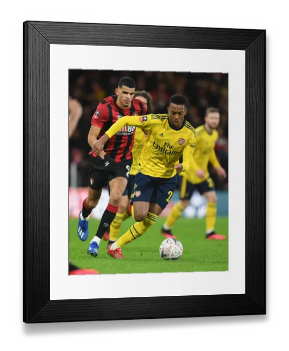 Framed Print : Arsenal's Joe Willock Clashes with Bournemouth's Dominic Solanke in FA Cup Fourth Round