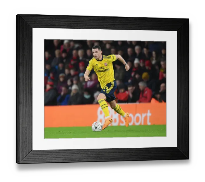 Framed Print : Granit Xhaka's Brilliant Midfield Display: Arsenal Advances in FA Cup with Victory Over AFC Bournemouth Framed Print : Granit Xhaka's Brilliant Midfield Display: Arsenal Advances in FA Cup with Victory Over AFC Bournemouth