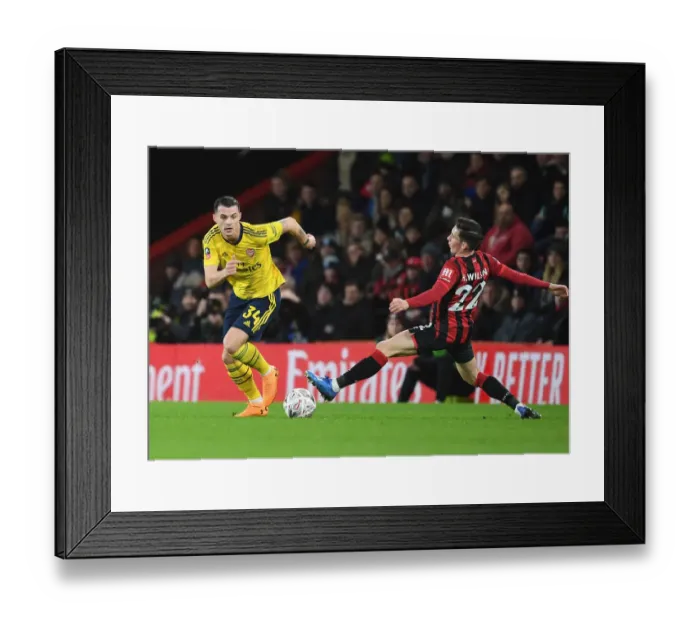 Framed Print : Xhaka's Powerful Surge: Arsenal's FA Cup Triumph Over Bournemouth Framed Print : Xhaka's Powerful Surge: Arsenal's FA Cup Triumph Over Bournemouth