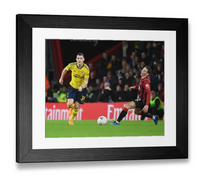 Framed Print : Granit Xhaka Breaks Past Harry Wilson: AFC Bournemouth vs. Arsenal FA Cup Fourth Round