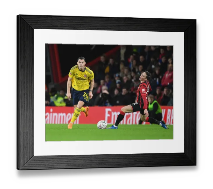 Framed Print : Xhaka's Powerful Surge: Arsenal's FA Cup Victory Over Bournemouth