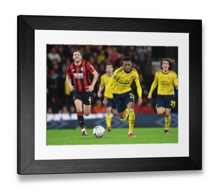 Framed Print : Arsenal's Joe Willock Breaks Past Bournemouth's Dan Gosling in FA Cup Fourth Round Clash Framed Print : Arsenal's Joe Willock Breaks Past Bournemouth's Dan Gosling in FA Cup Fourth Round Clash