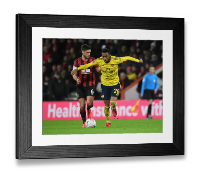 Framed Print : Joe Willock vs. Lewis Cook: Intense FA Cup Showdown between Arsenal and Bournemouth