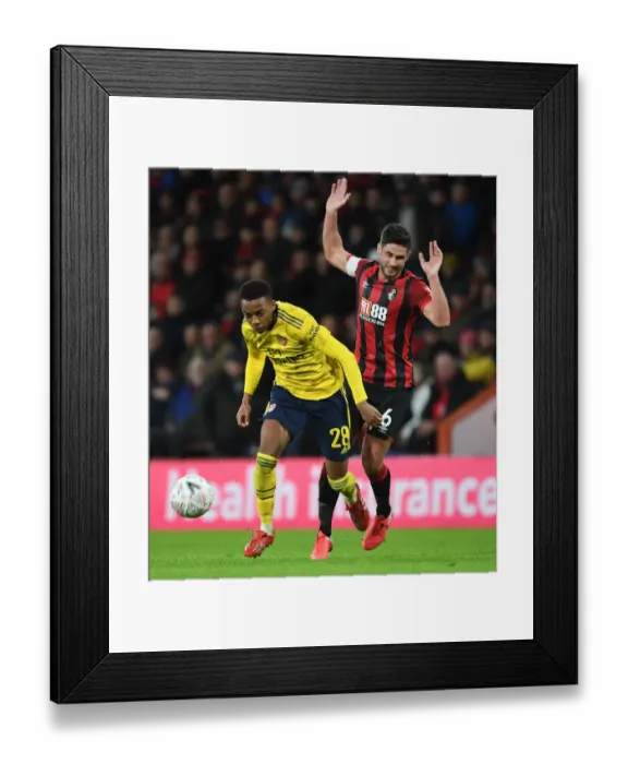 Framed Print : Arsenal's Joe Willock vs. Lewis Cook: Intense FA Cup Showdown at Bournemouth