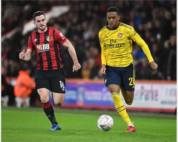 Clash of Midfield Maestros: Joe Willock vs. Lewis Cook in FA Cup Fourth Round