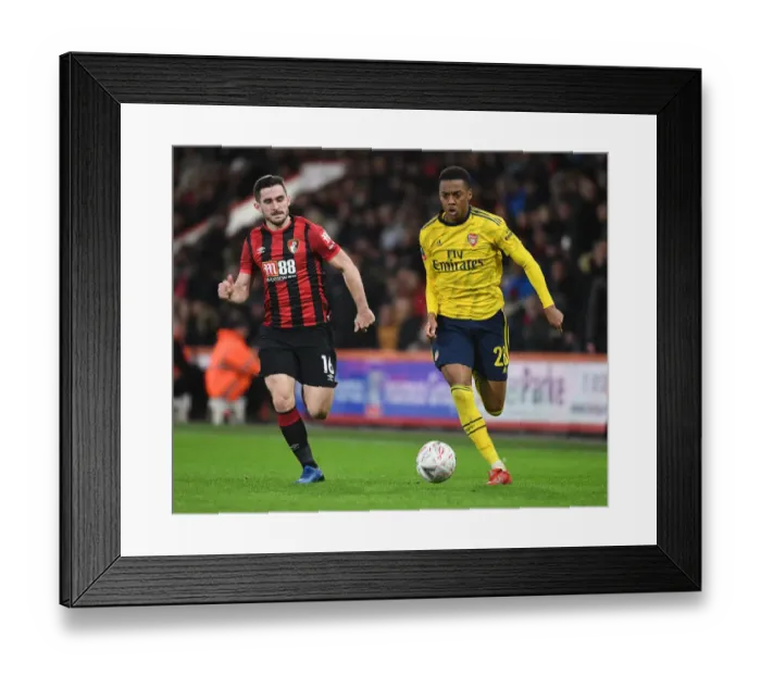 Framed Print : Clash of Midfield Maestros: Joe Willock vs. Lewis Cook in FA Cup Fourth Round