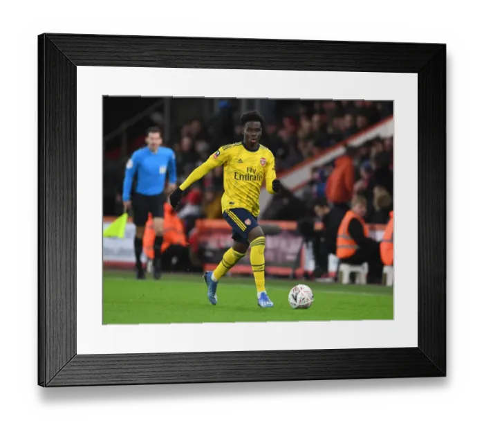Framed Print : Arsenal's Bukayo Saka in Action against AFC Bournemouth in FA Cup Fourth Round