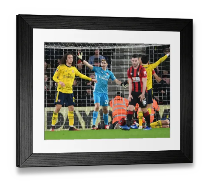 Framed Print : Arsenal vs. AFC Bournemouth: FA Cup Fourth Round Battle at Vitality Stadium Framed Print : Arsenal vs. AFC Bournemouth: FA Cup Fourth Round Battle at Vitality Stadium