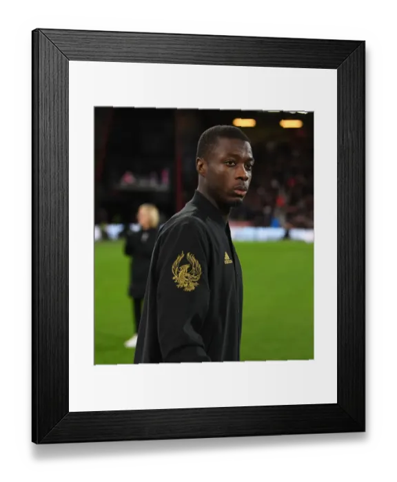 Framed Print : Arsenal's Nicolas Pepe Gears Up for FA Cup Clash Against AFC Bournemouth