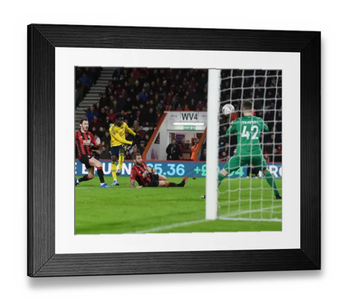 Framed Print : Arsenal's Bukayo Saka Scores First Goal in FA Cup Fourth Round Win over AFC Bournemouth