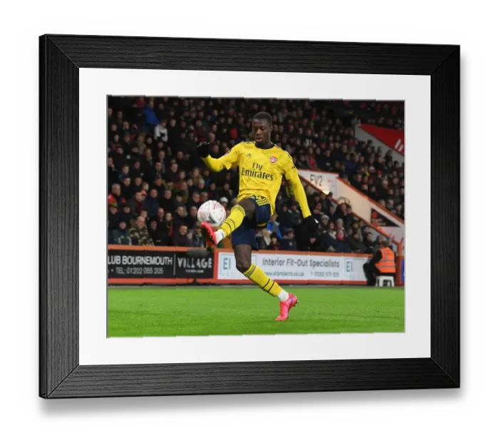 Framed Print : Arsenal's Nicolas Pepe in Action against AFC Bournemouth in FA Cup Fourth Round