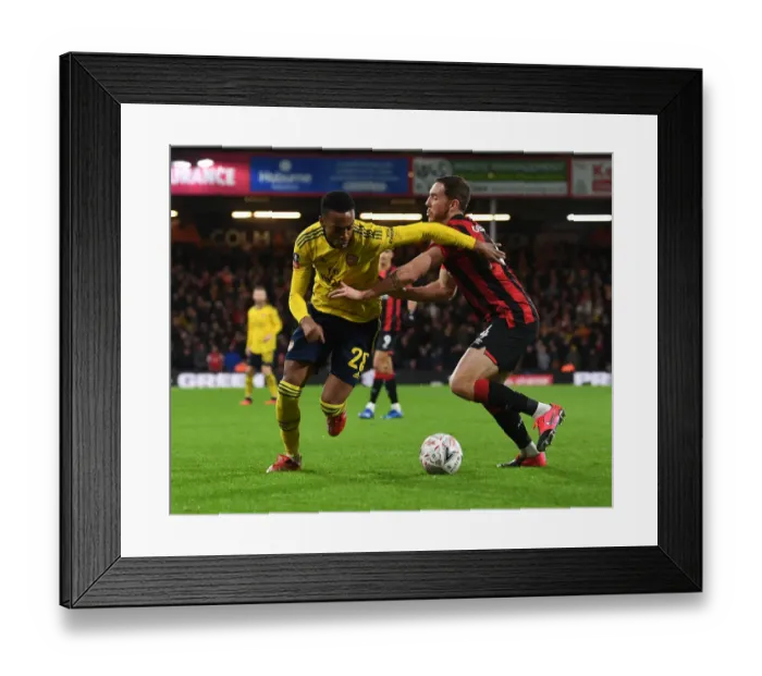 Framed Print : Arsenal's Joe Willock Fends Off Bournemouth's Dan Gosling in FA Cup Clash Framed Print : Arsenal's Joe Willock Fends Off Bournemouth's Dan Gosling in FA Cup Clash