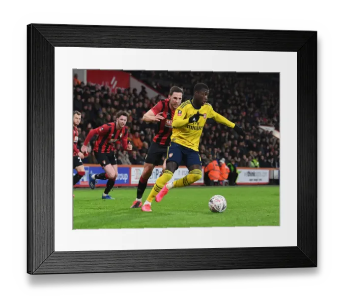 Framed Print : Arsenal's Nicolas Pepe in Action: FA Cup Clash Against AFC Bournemouth Framed Print : Arsenal's Nicolas Pepe in Action: FA Cup Clash Against AFC Bournemouth