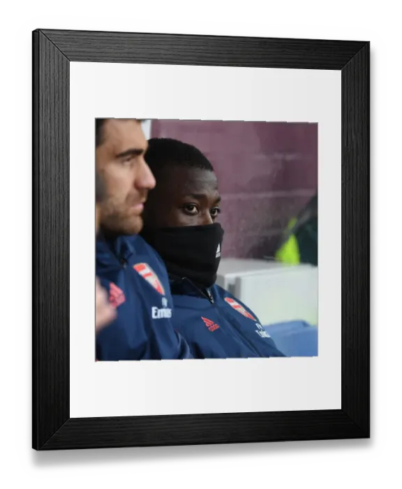 Framed Print : Arsenal's Nicolas Pepe Ready to Enter the Field: Burnley vs Arsenal, Premier League 2019-2020 Framed Print : Arsenal's Nicolas Pepe Ready to Enter the Field: Burnley vs Arsenal, Premier League 2019-2020
