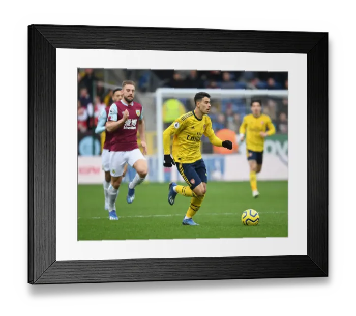 Framed Print : Martinelli vs Taylor: A Fiery Battle in Burnley vs Arsenal Premier League Clash