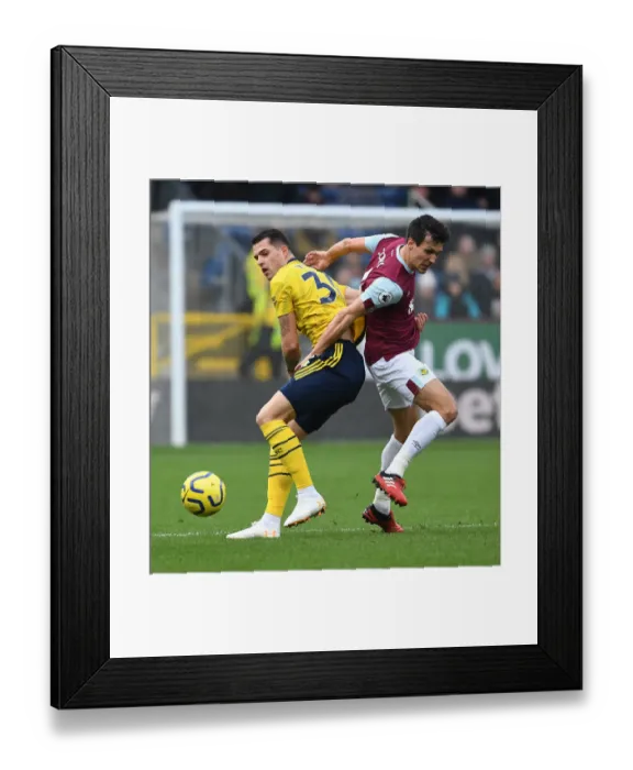 Framed Print : Burnley vs Arsenal: Granit Xhaka Clashes with Jack Cork in Premier League Showdown