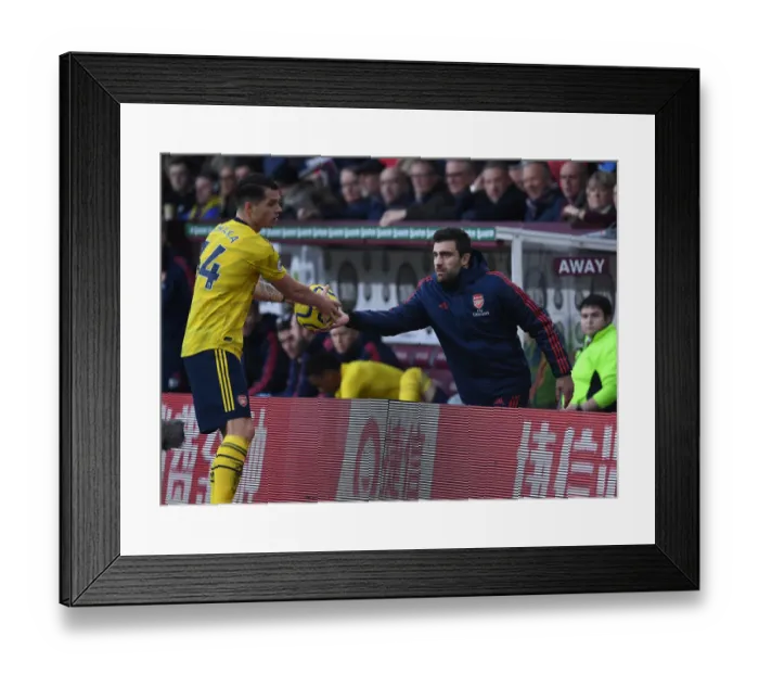 Framed Print : Sokratis and Xhaka: A Moment from the Burnley vs. Arsenal Premier League Clash