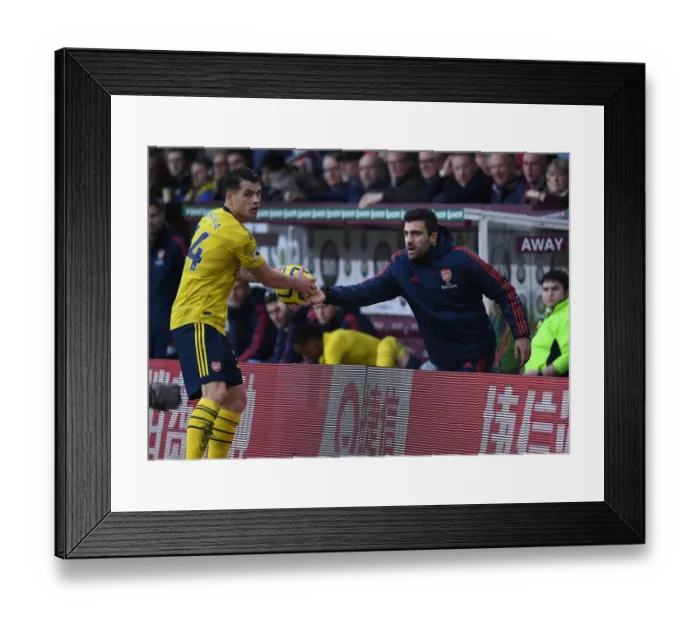 Framed Print : Arsenal's Sokratis and Xhaka: A Moment of Respite Amidst Burnley's Pressure (Burnley v Arsenal 2019-20)