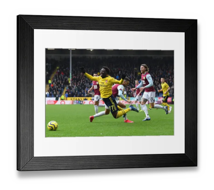 Framed Print : Burnley vs. Arsenal: Bukayo Saka Foul by Matthew Lowton - Premier League 2019-2020