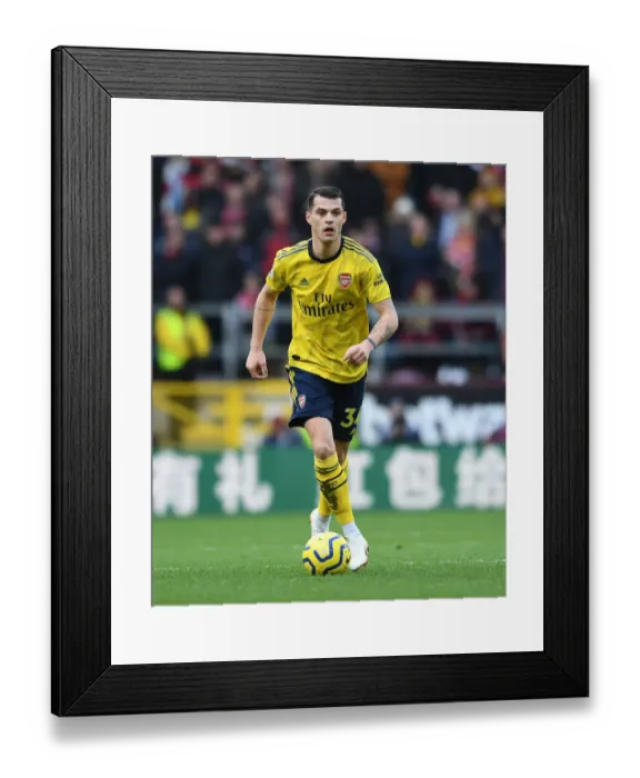 Framed Print : Granit Xhaka's Premier League Battle: Arsenal vs. Burnley FC Framed Print : Granit Xhaka's Premier League Battle: Arsenal vs. Burnley FC