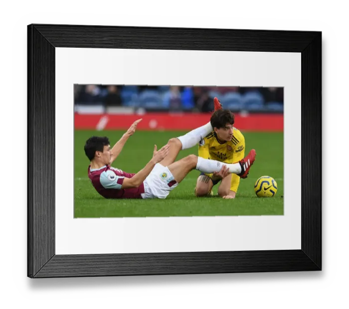 Framed Print : Bellerin vs Cork: Intense Battle in Burnley vs Arsenal Premier League Clash