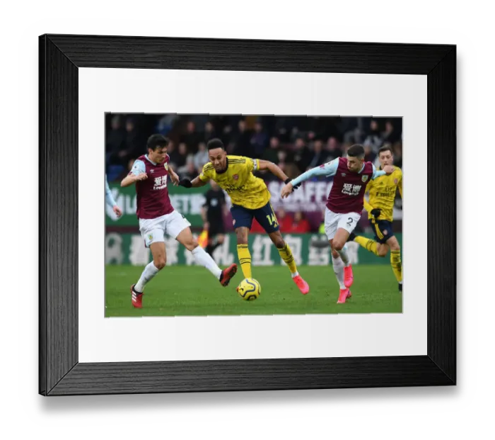 Framed Print : Aubameyang Faces Off Against Burnley: Intense Moment from Arsenal's Premier League Clash