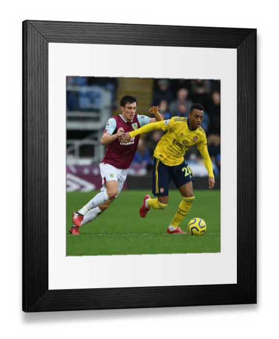 Framed Print : Burnley vs. Arsenal: Clash between Joe Willock and Jack Cork in the Premier League