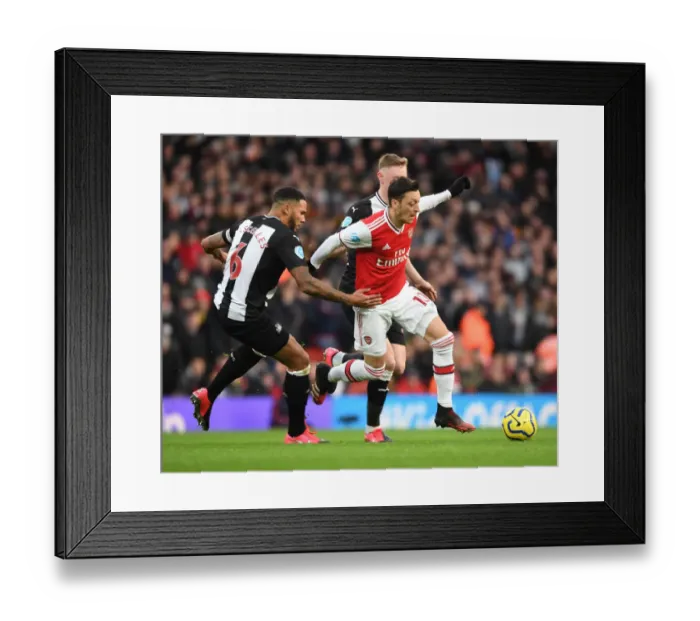 Framed Print : Arsenal vs Newcastle United: Premier League Showdown at Emirates Stadium Framed Print : Arsenal vs Newcastle United: Premier League Showdown at Emirates Stadium