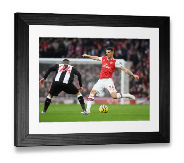Framed Print : Arsenal vs Newcastle United: Premier League Showdown at Emirates Stadium Framed Print : Arsenal vs Newcastle United: Premier League Showdown at Emirates Stadium