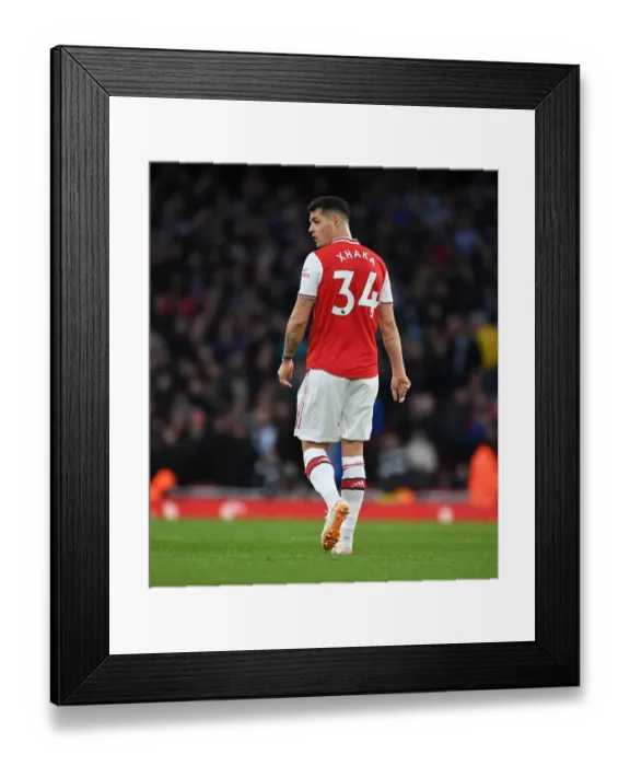 Framed Print : Arsenal vs Newcastle United: Premier League Showdown at Emirates Stadium