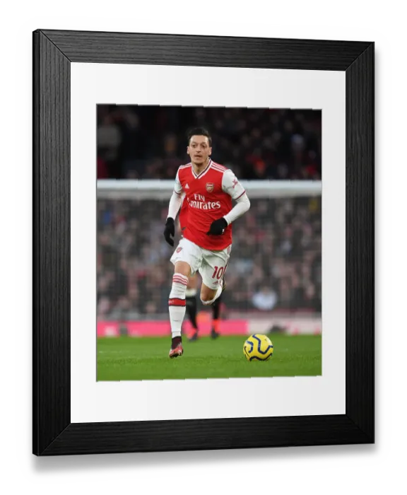 Framed Print : Arsenal vs Newcastle United: Premier League Showdown at Emirates Stadium